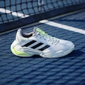 Ženska obutev za tenis adidas Barricade 13 W FTWWHT/CBLACK/CRYJAD
